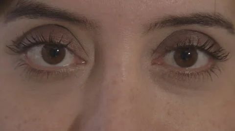 Woman's Eyes Looking Up and Down and a Smile Stock Footage 47562583