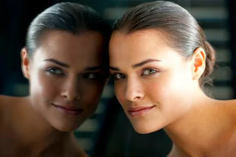 Woman's face in a mirror Stock Photos