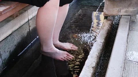 Woman's feet in a footbath Stock Footage 236996173