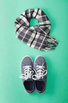 Woman's flat lay clothes gray hat scarf in a box Stock Photos