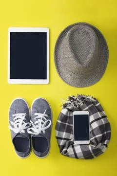 Woman's flat lay gray clothes tablet and mobile phone mockup Stock Photos