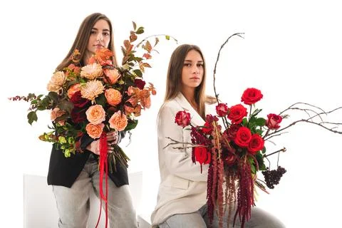 Womans with flowers Stock Photos