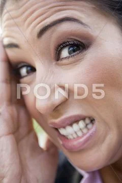 Woman's frustrated face outdoors (selective focus) Stock-Fotos