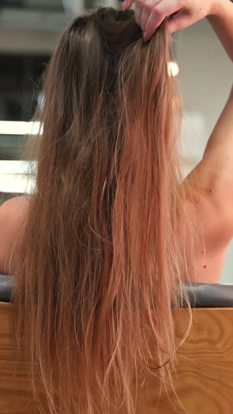 Woman's hair texture. Close-up view of a girl touching her straight healthy.. Vídeo Stock 340226659