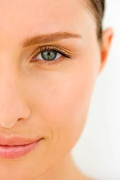 Woman's half face Stock Photos