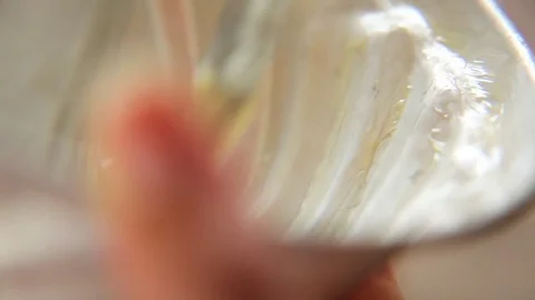 Woman's hand basting cake tray with brush Video stock 76099938