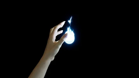 Woman's hand with blue fire sphere in the middle of the screen, 4k footage with Stock Footage 115638745