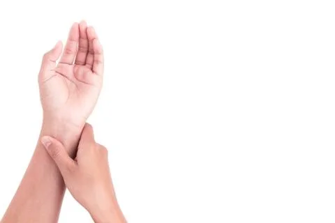 Woman's hand checking pulse on wrist, health care and medical concept Stock Photos