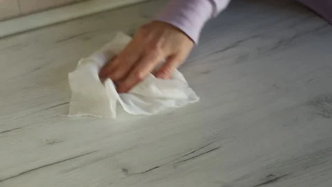 Woman's hand cleaning table Stock Footage 164634125