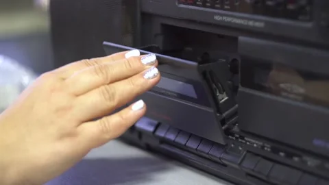 Woman's hand closes the cassette deck 4K Stock Footage 168892788