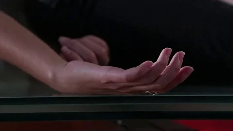 The woman's hand is compressed with anger. The actress plays anger. Stock Footage 80883210