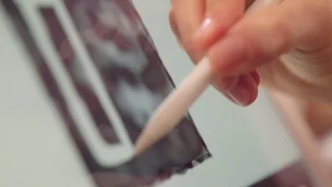 Woman's hand drawing on tablet Stock Footage 77044661