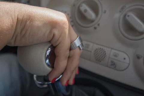 Woman's hand to drive Stock Photos