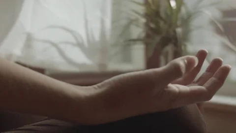 Woman's hand during meditation Stock Footage 75334815