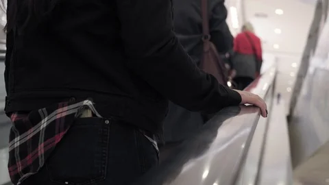 Woman's hand on escalator Video stock 98215986