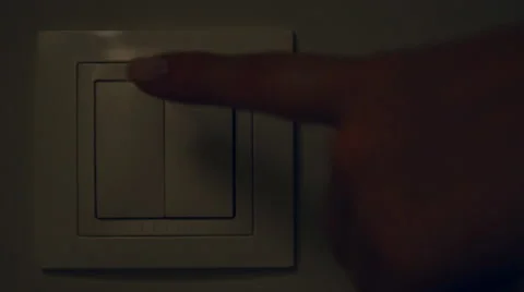 Womans hand with finger on light switch. Video stock 58216666