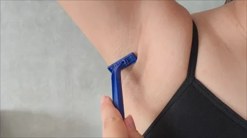 A womans hand flips through a stack of napkins Video stock 313520950