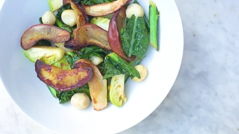 Woman's hand having salad with fork Video stock 76100079