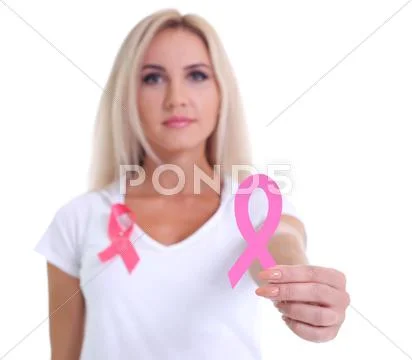 Womans hand holding pink breast cancer awareness ribbon Stock Photos