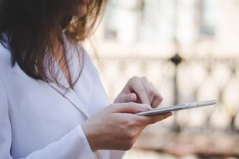 Woman's hand holding white tablet pc Stock Photos