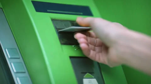 The woman`s hand inserting credit card in atm. Without human face Stock Footage 61197937