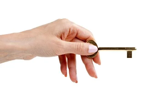 Woman's hand with a key Stock Photos