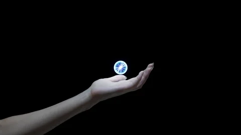 Woman's hand with lightning ball in the middle of the screen, 4k footage with Stock Footage 115638856