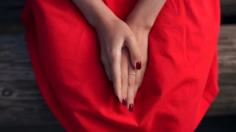 Woman's hand make a heart shape and holding a red heart shape. Видео 63355823