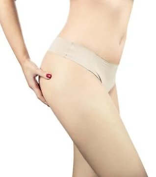 Woman's hand making anti cellulite massage on her hips Stock Photos