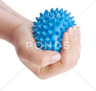 Woman's hand with massage ball Stock Photos
