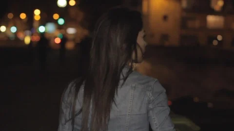 Woman's hand moving on the railing of a bridge in slow motion in Paris by night. Stock Footage 110763211