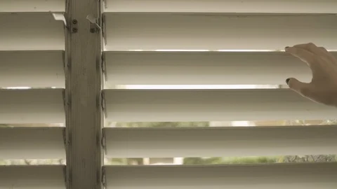 Woman’s hand opening window blinds. Looking outside POV 스톡 동영상 129115178