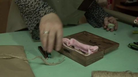A woman's hand opens a craft box Stock Footage 123005553