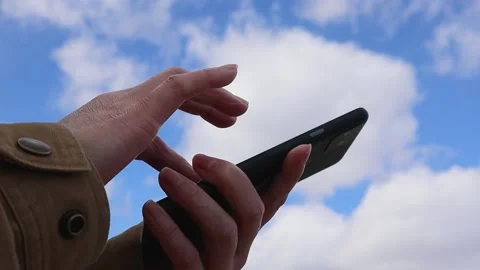 Woman's hand operating a smartphone, Part 2 Stock Footage 234282129