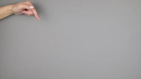 Woman's hand pointing down. Copy space Stock Footage 138803853