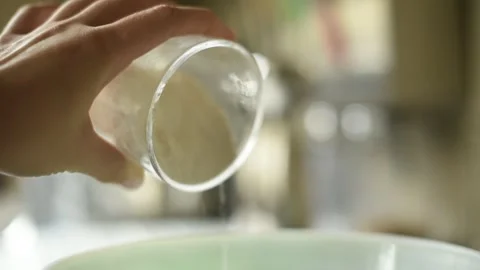 Womans Hand Pouring Flour for Baking Stock Footage 314382665