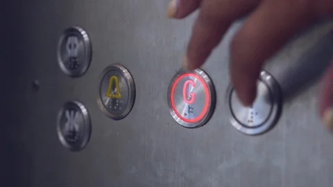 A woman's hand pushes a button in the elevator. slow motion. 1920x1080. full hd Stock Footage 88800125