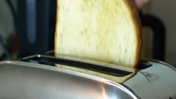 Woman's Hand Putting Two Slices Of Bread In The Toaster, Breakfast Stock Footage 85556916