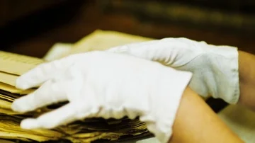 Woman's hand reading an ancient book, dolly shoot Stock Footage 85685743