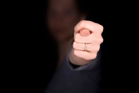 Woman's hand with a ring shows fig gesture Stock Photos