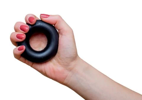 Woman's hand with rubber ring (hand gripper). Sport and equipment. Isolated. 스톡 사진