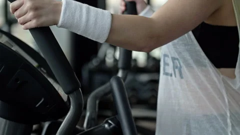 Woman's hand sets the parameters on the display of the simulator. Stock Footage 245972540