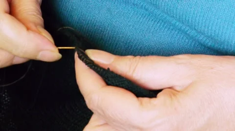 Woman's Hand Sewing Stock Footage 10605234