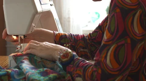 Woman's hand sewing on the sewing machine Stock Footage 68042150