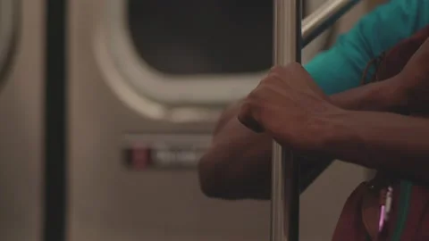 Woman's Hand on Subway Stock Footage 130484838