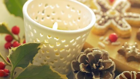 A woman's hand takes a shortbread sugar cookie from a table Stock Footage 70144492