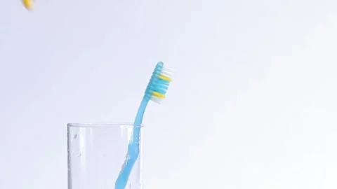 A woman's hand takes a toothbrush, close-up. Brush your teeth Stock Footage 246700920