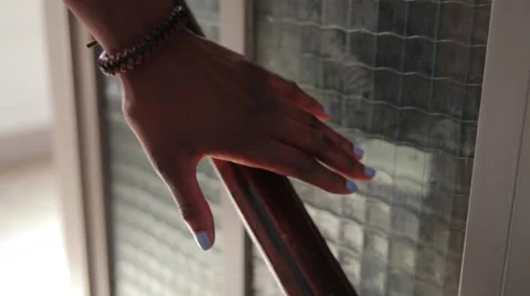 Woman's hand is taking a handrail Stock Footage 52887856