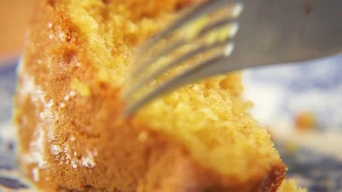 Woman's hand taking a slice of cake with fork Stock-Footage 76099894