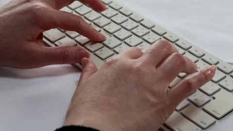 Woman's hand tapping on keyboard Stock Footage 236435025